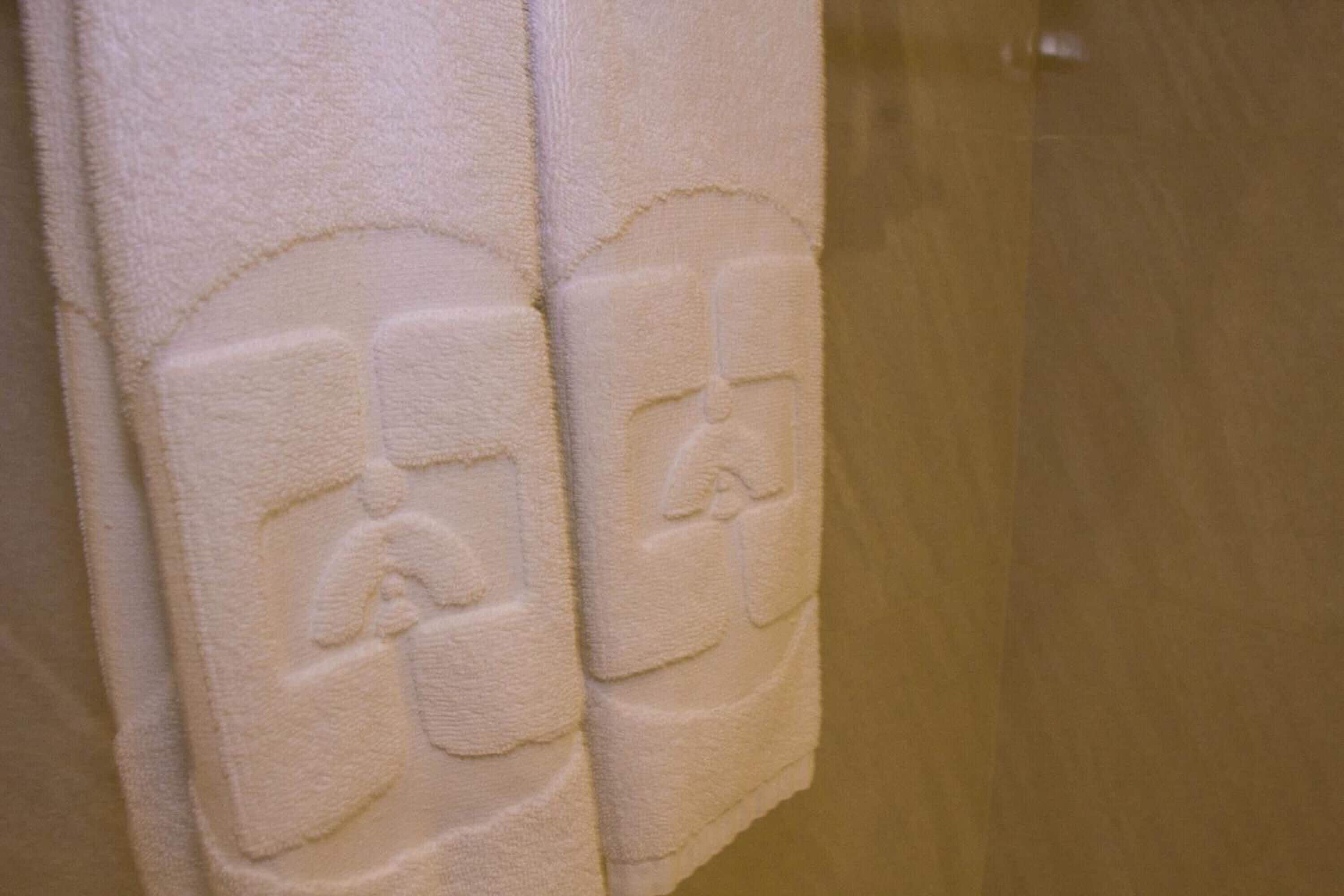 free toiletries, hair dryer, slippers, towels