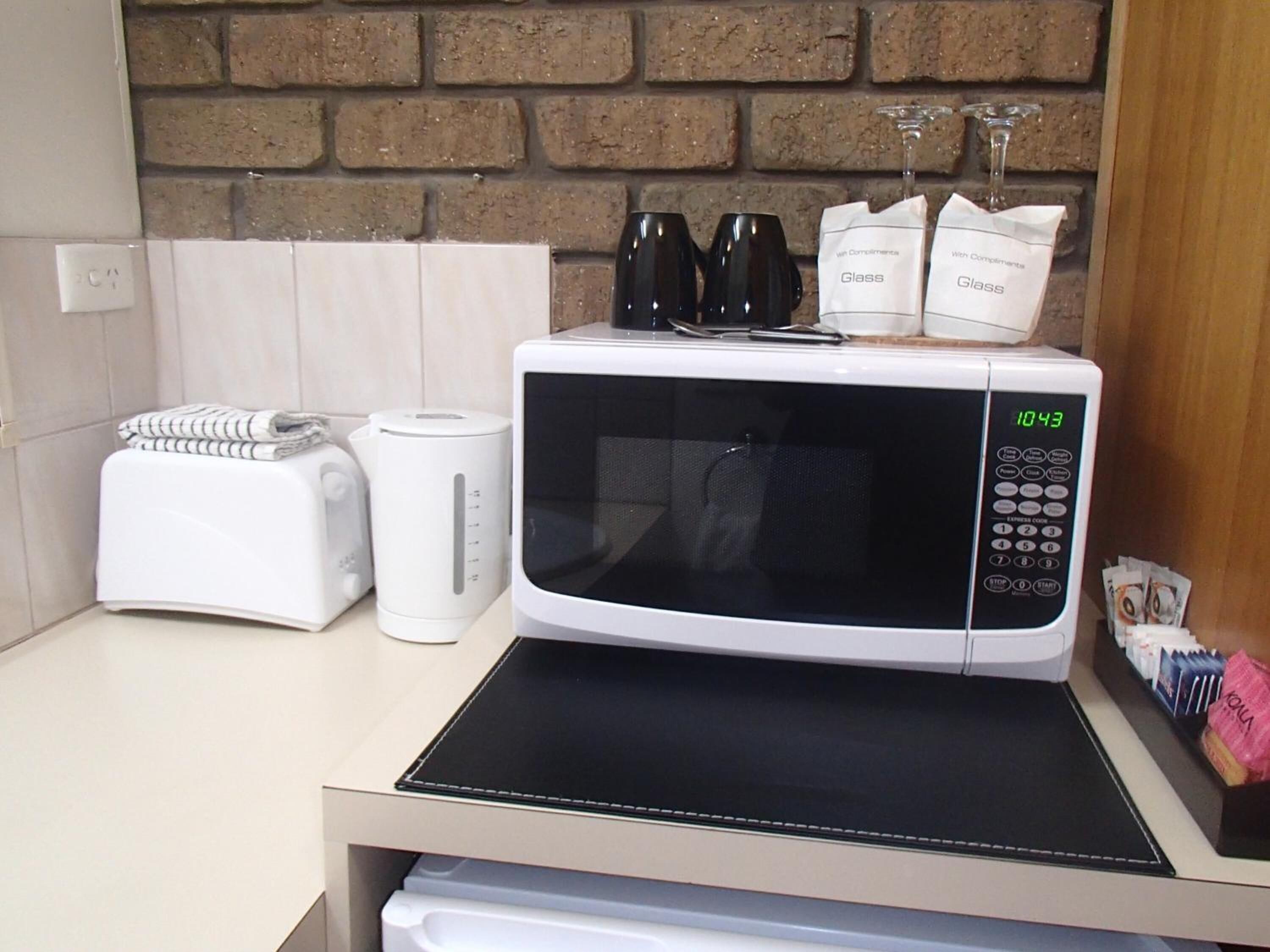 fridge, microwave, coffee/tea maker, electric kettle