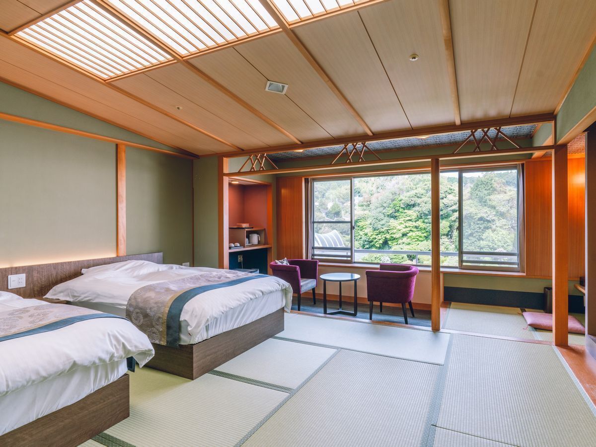 Superior Twin Room, Non Smoking, Garden View | Gebar bulu kapas, peti besi dalam bilik, Wi-fi percuma, cadar katil 