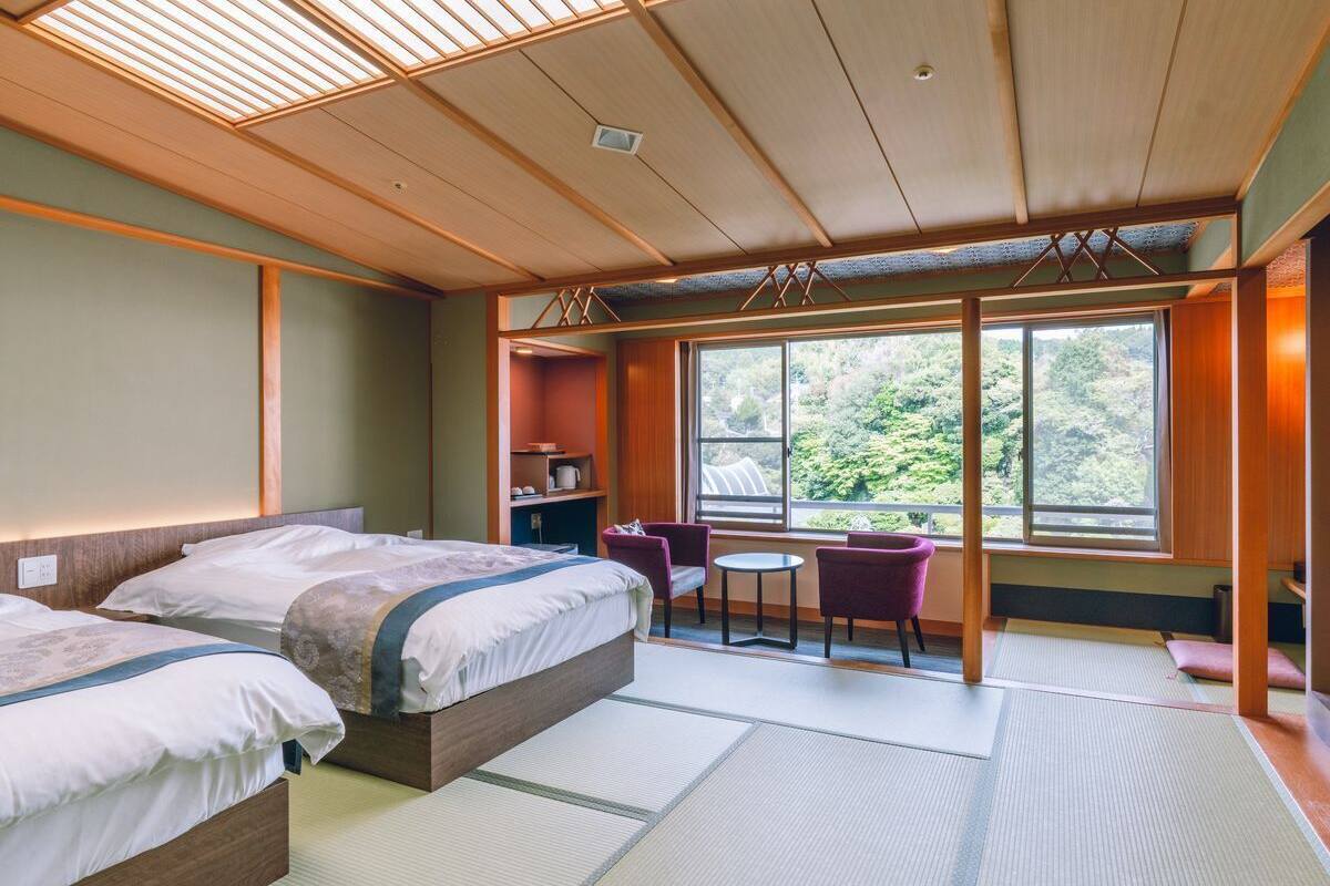 Superior Twin Room, Non Smoking, Garden View | Gebar bulu kapas, peti besi dalam bilik, Wi-fi percuma, cadar katil