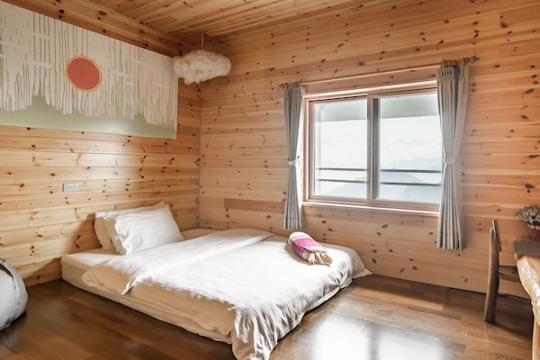 Double Room, Mountain View | Down comforters, individually decorated, individually furnished