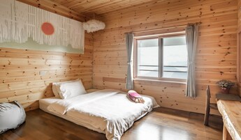 Double Room, Mountain View | Down comforters, individually decorated, individually furnished