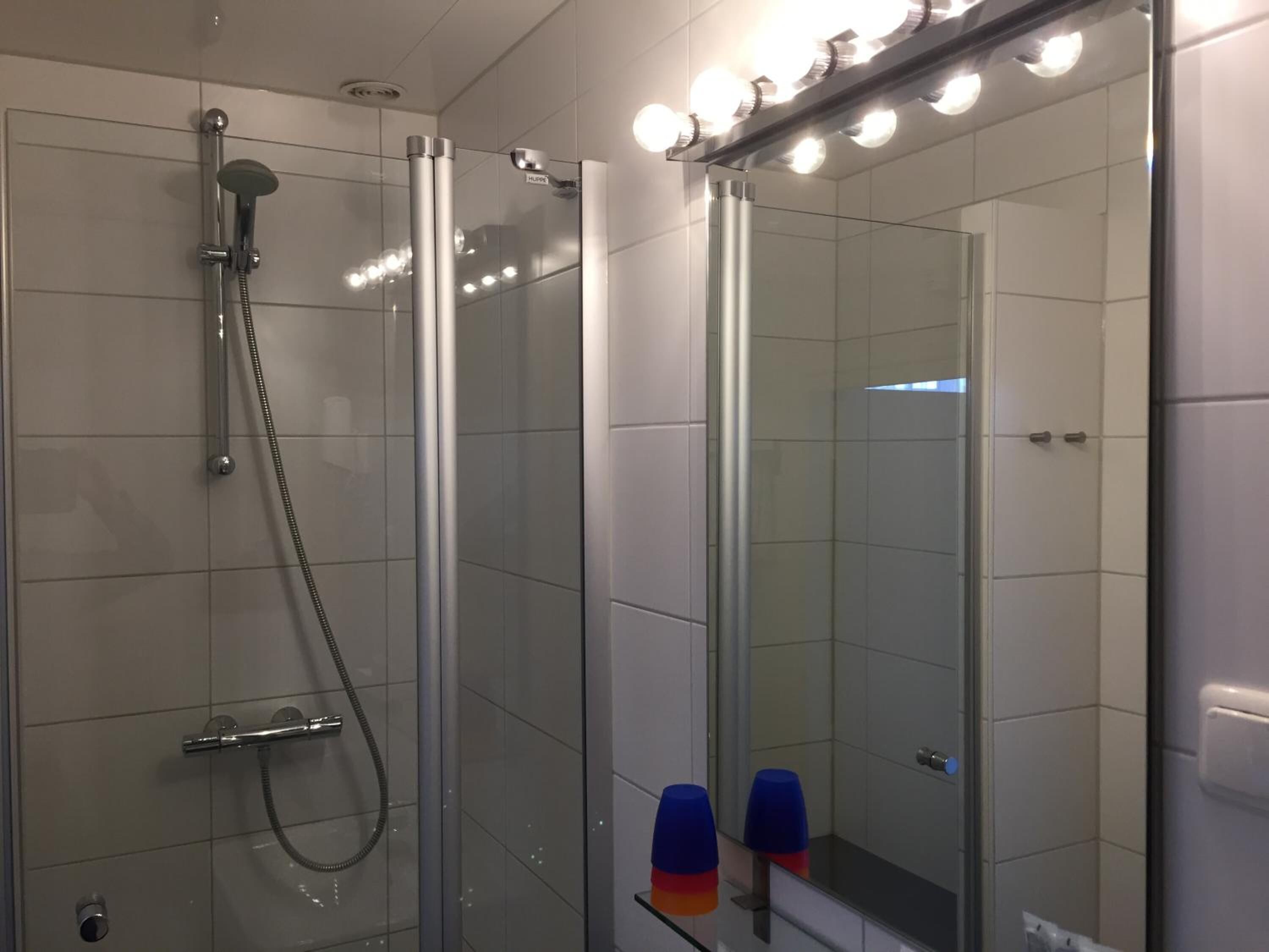 shower, free toiletries, hair dryer, towels