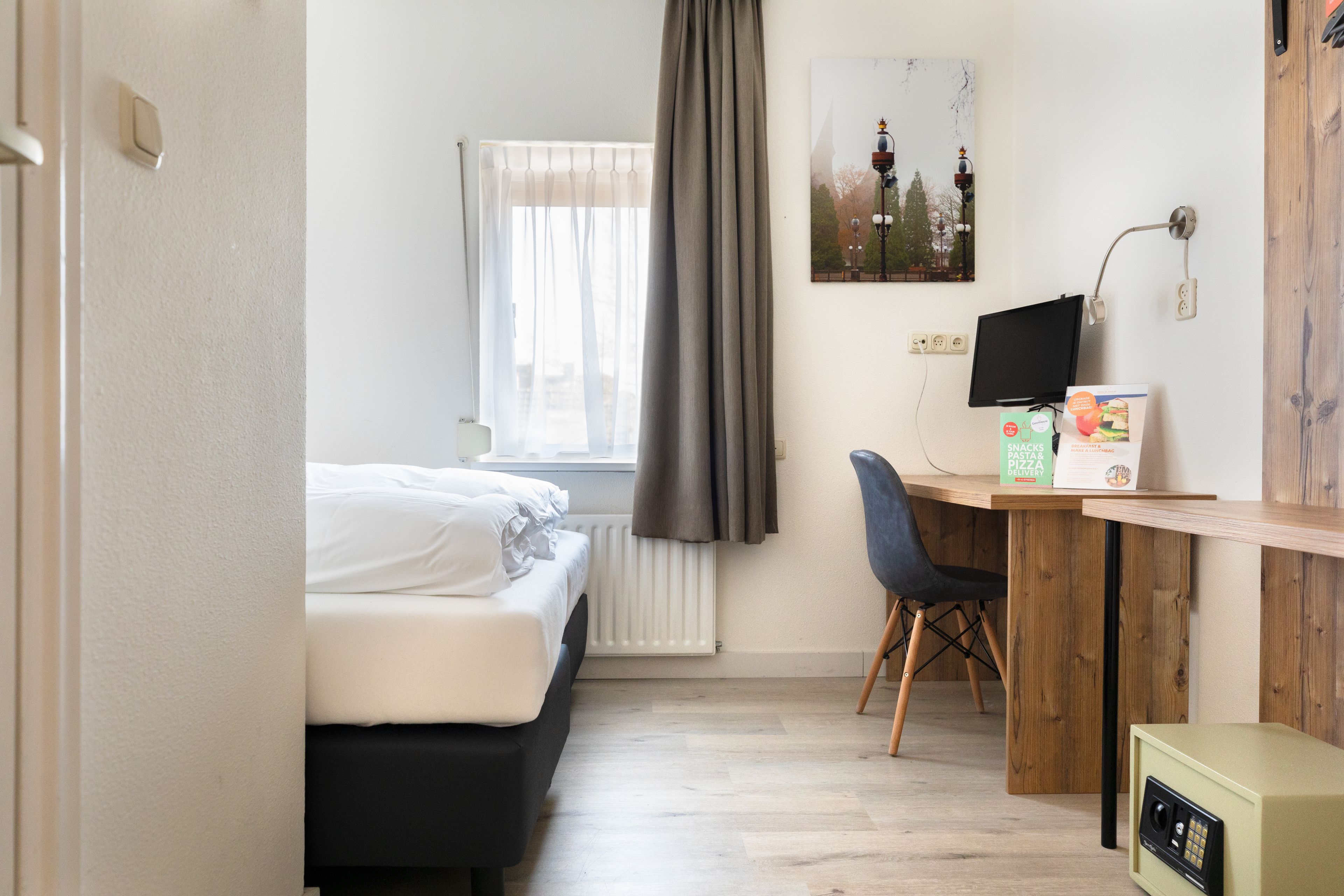 economy single room | in-room safe, desk, blackout curtains, soundproofing