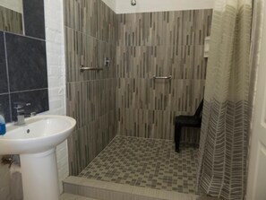 Shower, free toiletries, hair dryer, towels