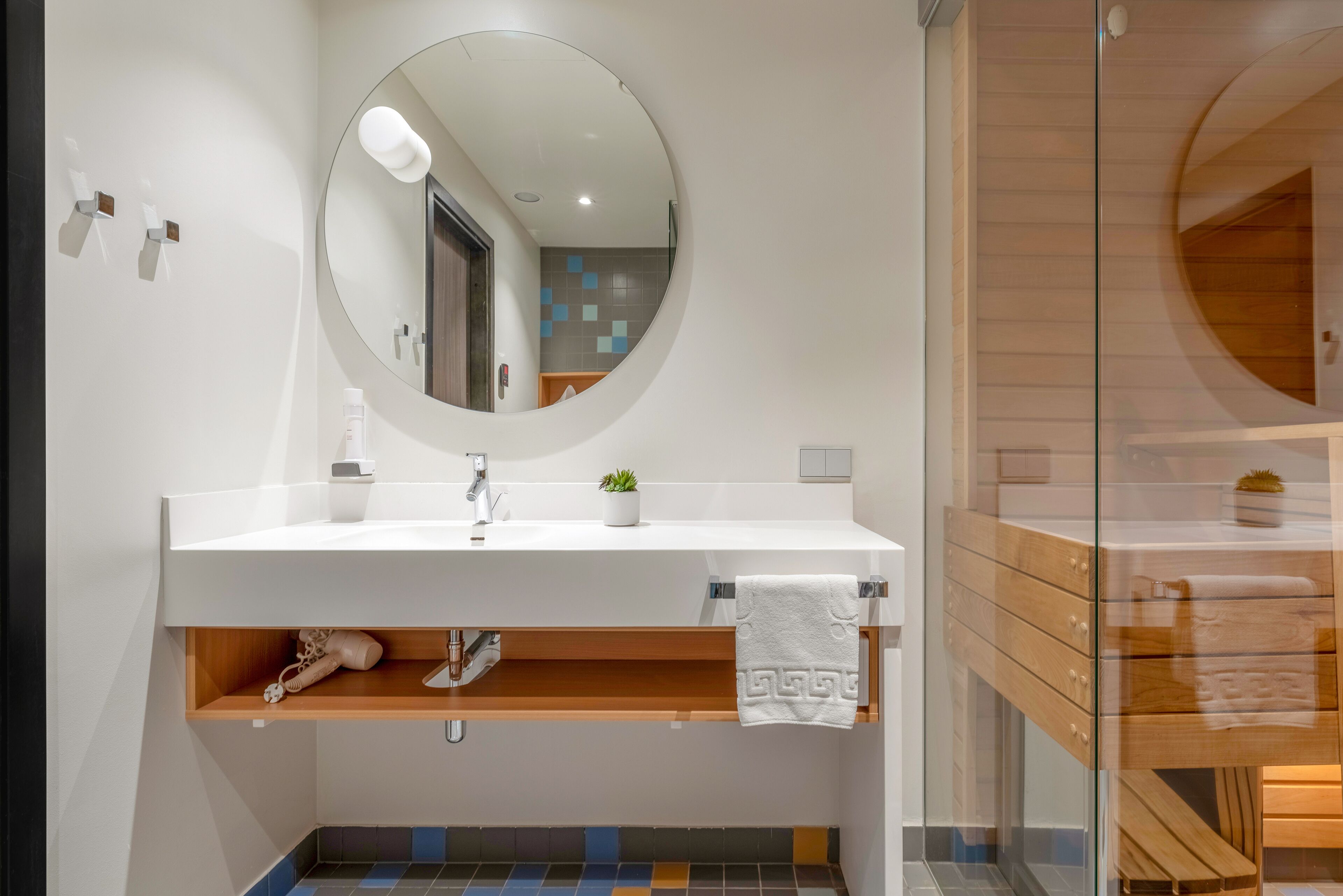 superior room, sauna | bathroom | eco-friendly toiletries, hair dryer, towels, soap