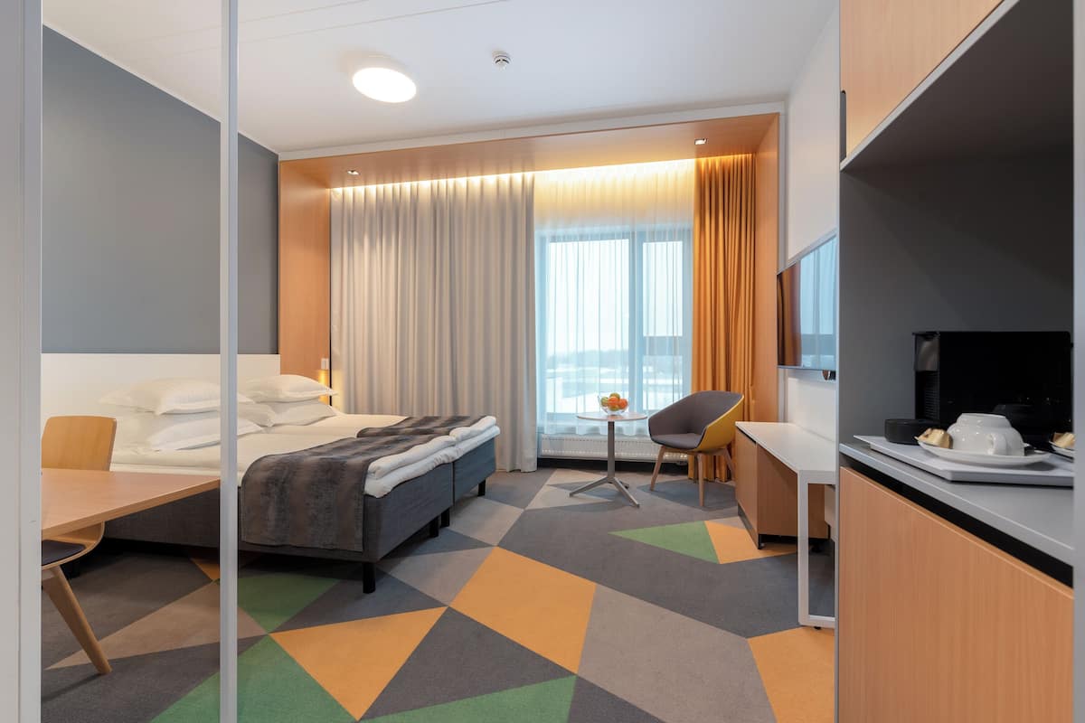 Hypoallergeen beddengoed, een kluis op de kamer, een bureau