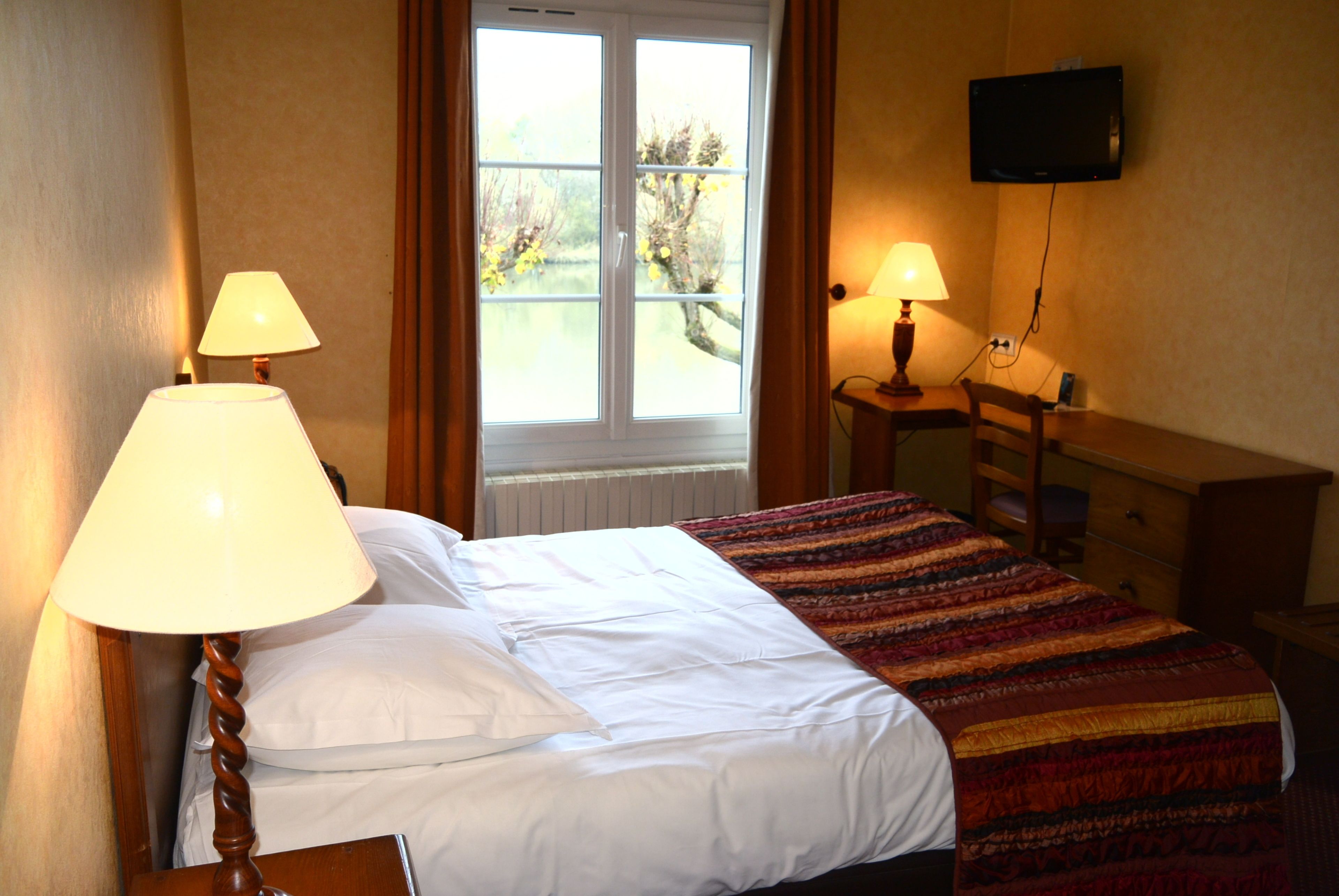 double room, river view | premium bedding, in-room safe, desk, free wifi