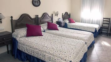 Triple Room | Premium bedding, in-room safe, desk, blackout drapes