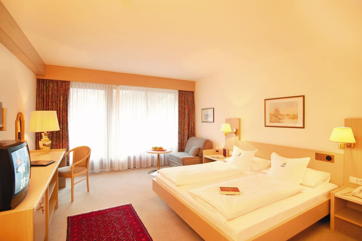 In-room safe, desk, iron/ironing board, cots/infant beds