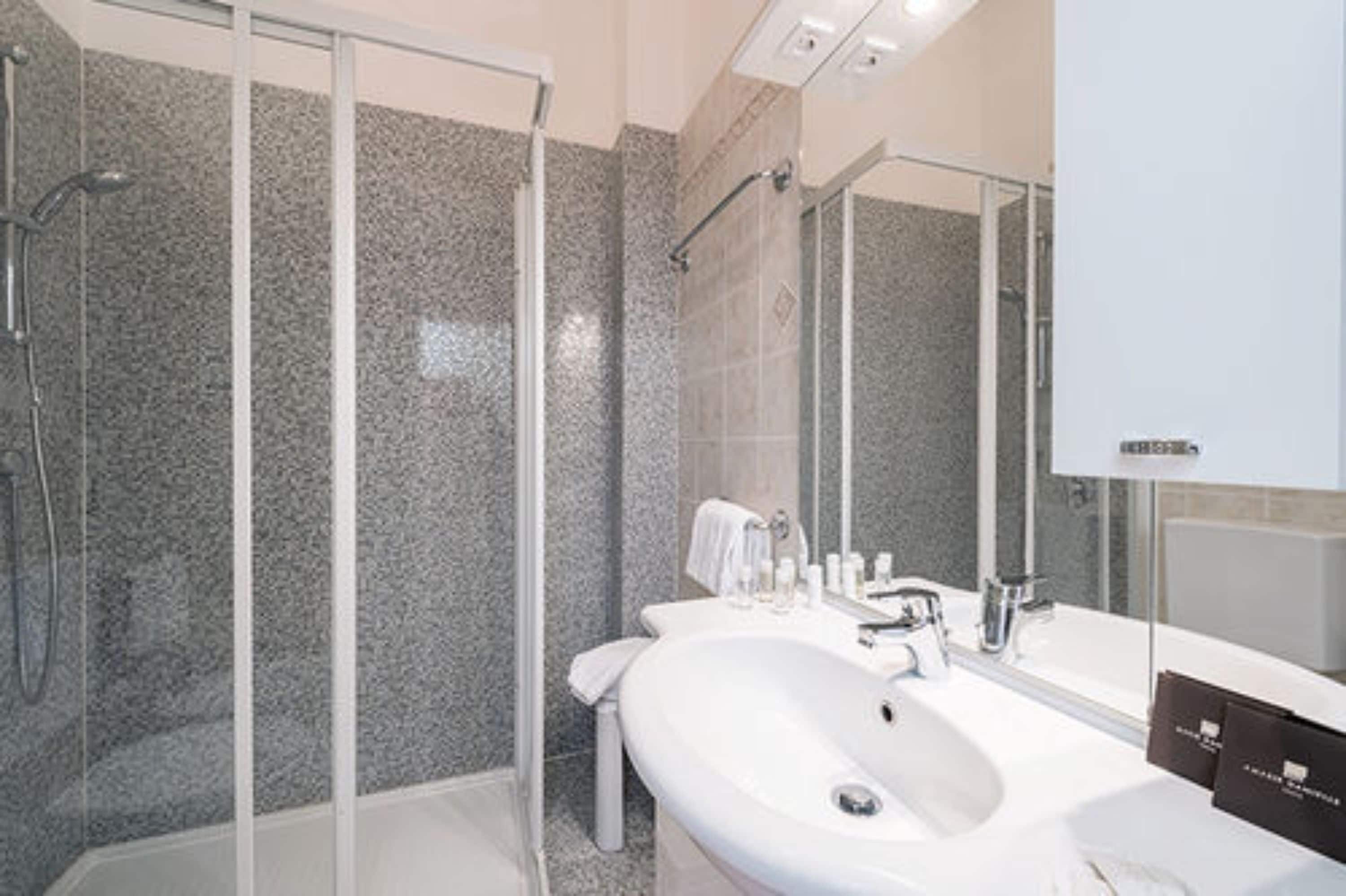 deluxe room, 1 queen bed, terrace, lakeside | bathroom | shower, free toiletries, hair dryer, towels