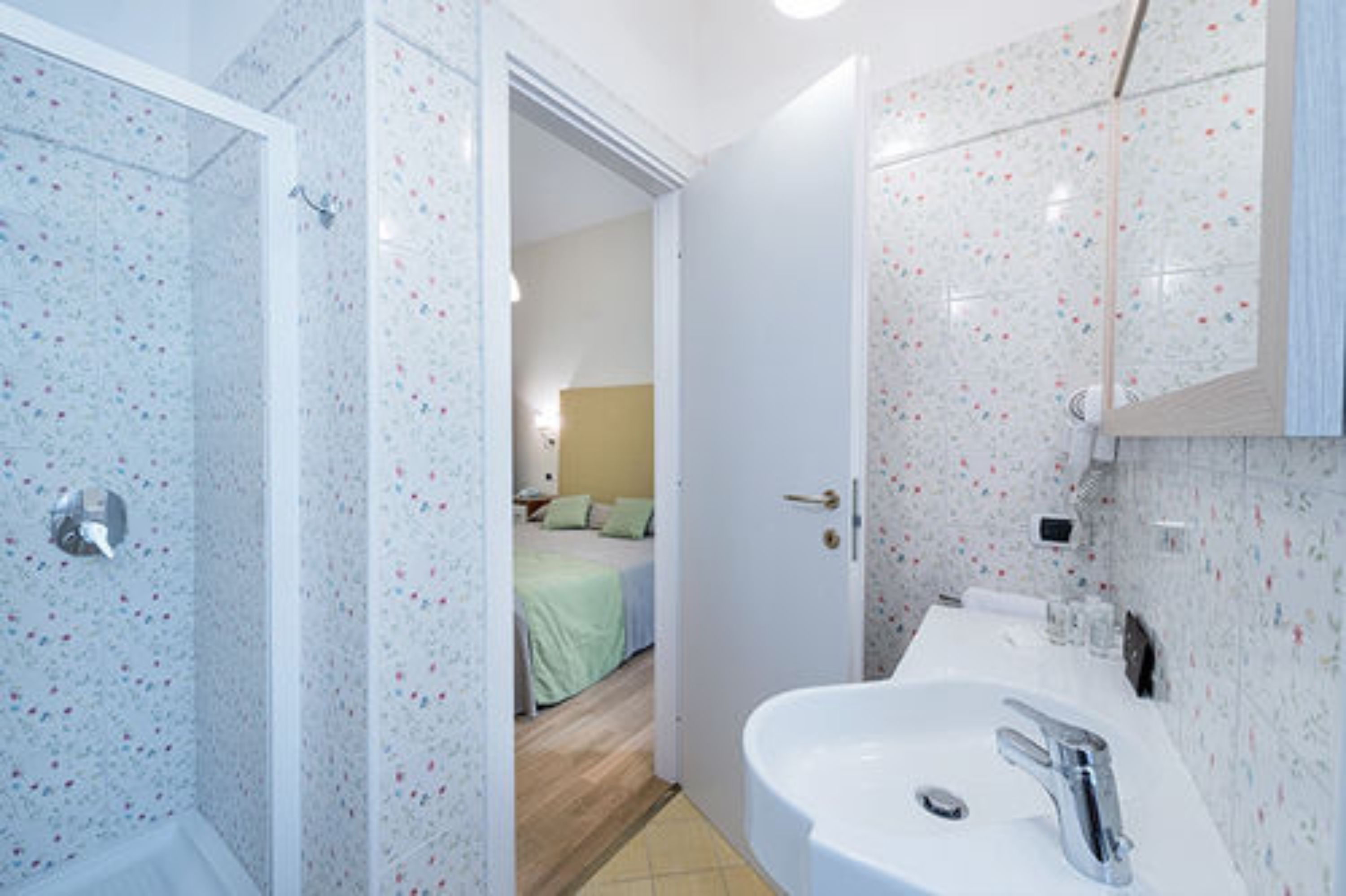 basic room, 1 queen bed | bathroom | shower, free toiletries, hair dryer, towels