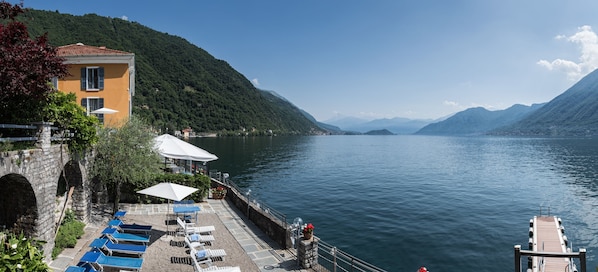 Private beach, white sand, sun loungers, beach umbrellas
