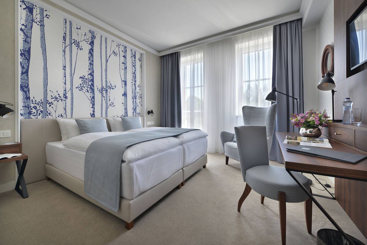 Elite Double or Twin Room (hotel EVA) | Minibar, in-room safe, desk, soundproofing