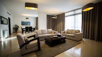 Executive Apartment, 3 Bedrooms, City View | Living area | Flat-screen TV, DVD player