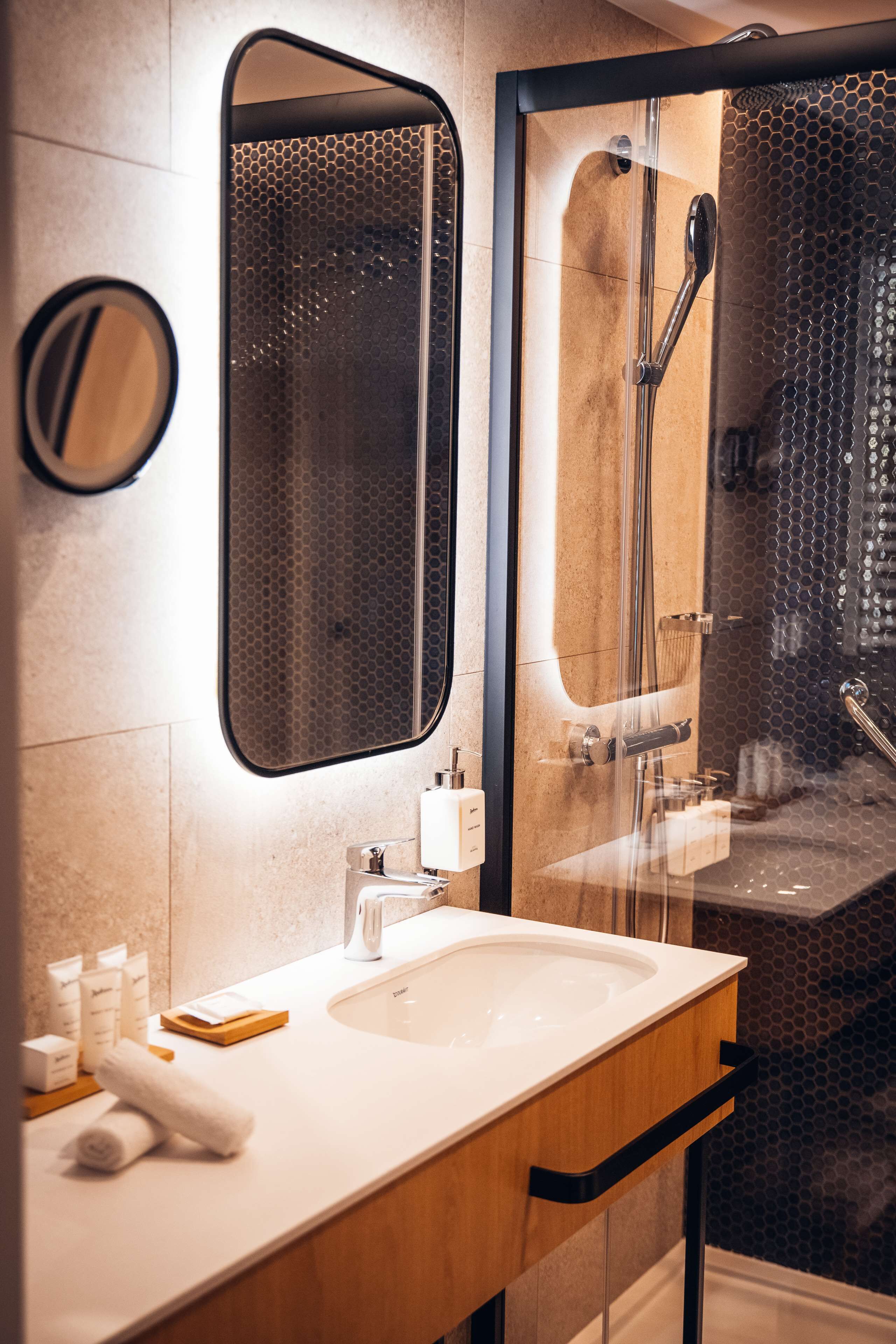suite | bathroom | shower, rainfall showerhead, eco-friendly toiletries, hair dryer
