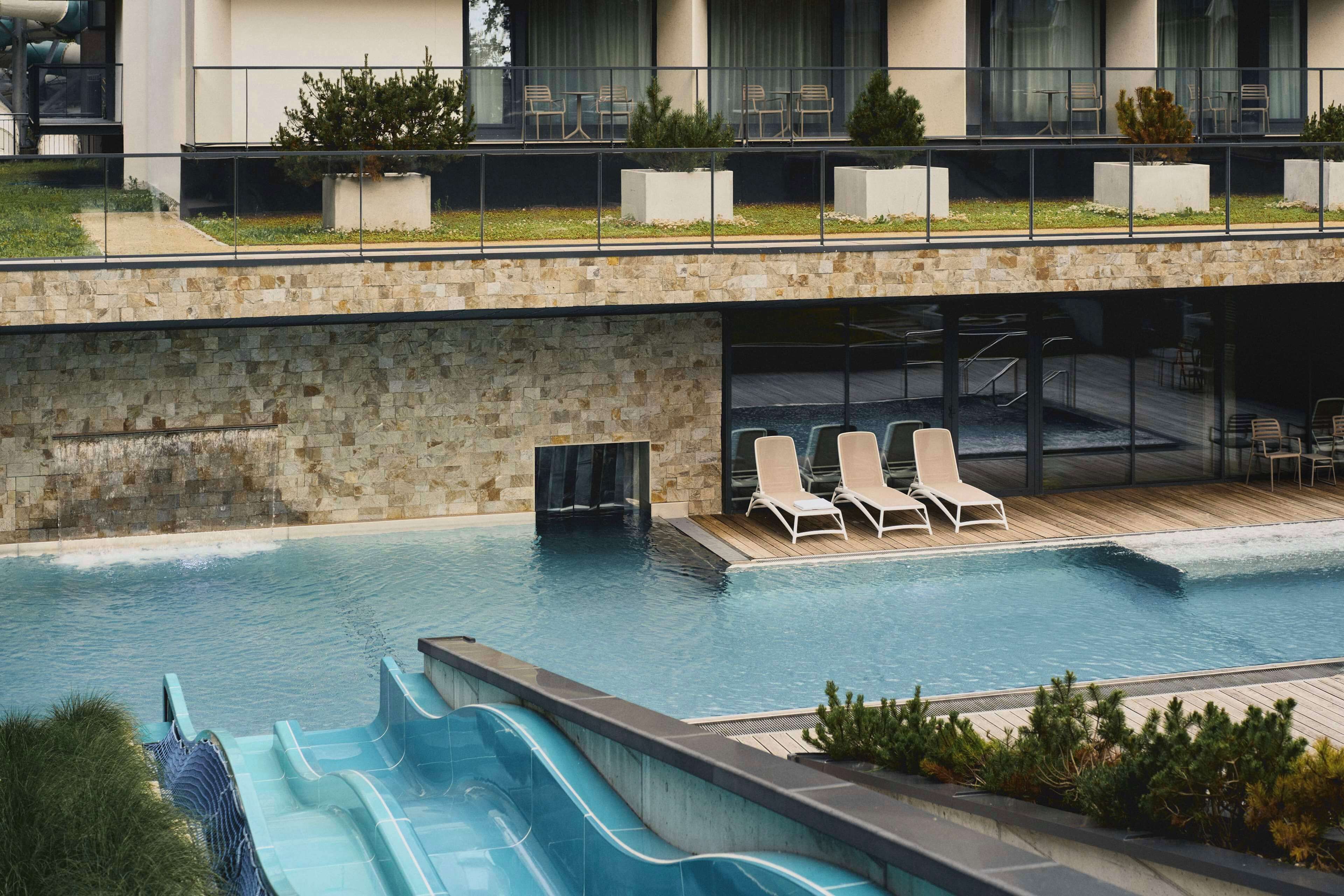 indoor pool, outdoor pool, open 9:00 am to 9:00 pm, pool loungers