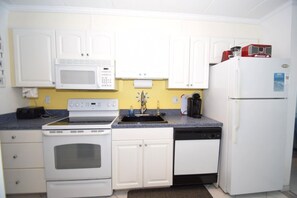 Condo, 1 Bedroom | Private kitchen | Full-size fridge, microwave, stovetop, dishwasher