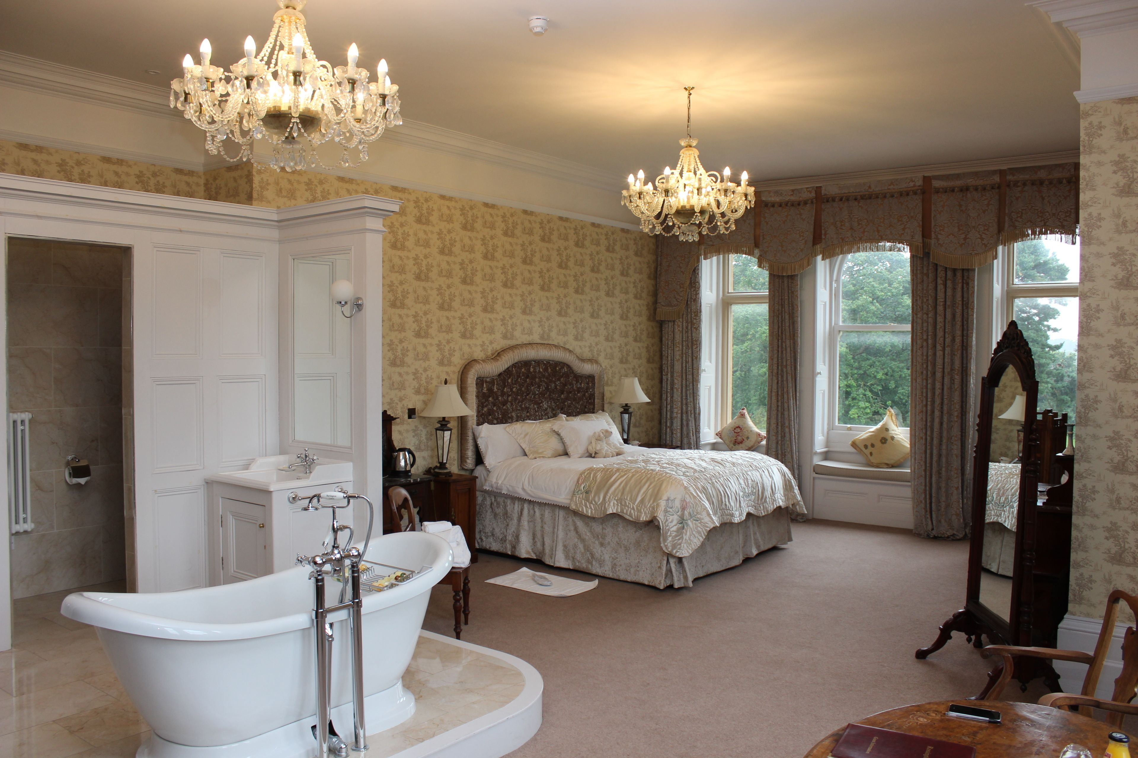 luxury suite, 1 king bed, garden view | bathroom | combined shower/bathtub, deep-soaking bathtub, rainfall showerhead