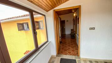 Apartment, 3 Bedrooms, Balcony (second floor) | Living area | Flat-screen TV