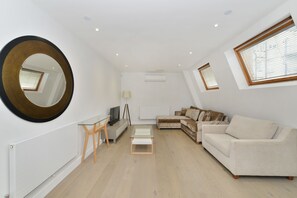 Luxury Apartment, 2 Bedrooms, City View | Living area | Flat-screen TV