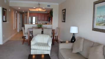 Condo, 2 Bedrooms, Balcony, Beachfront | Living area | Flat-screen TV, DVD player