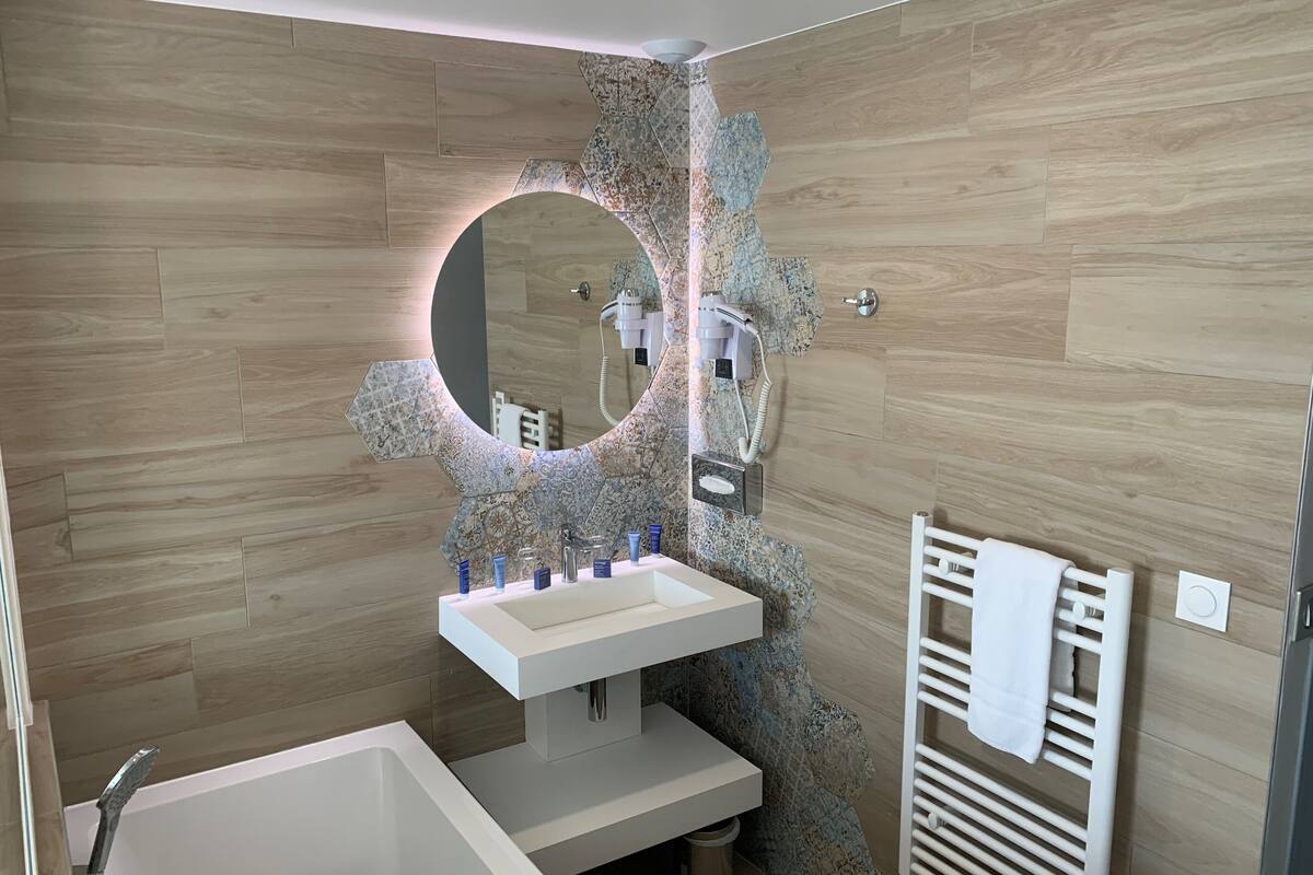 romantic room | bathroom | hair dryer, towels, soap, shampoo