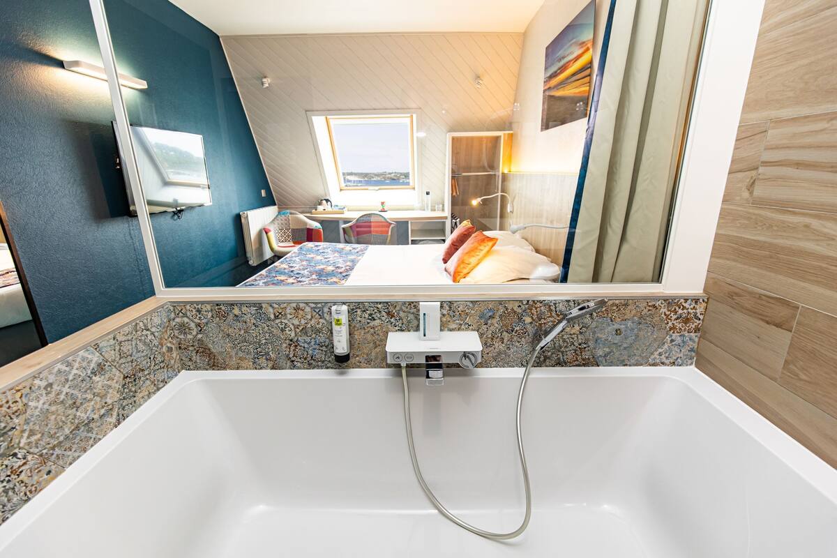 romantic room | bathroom | hair dryer, towels, soap, shampoo