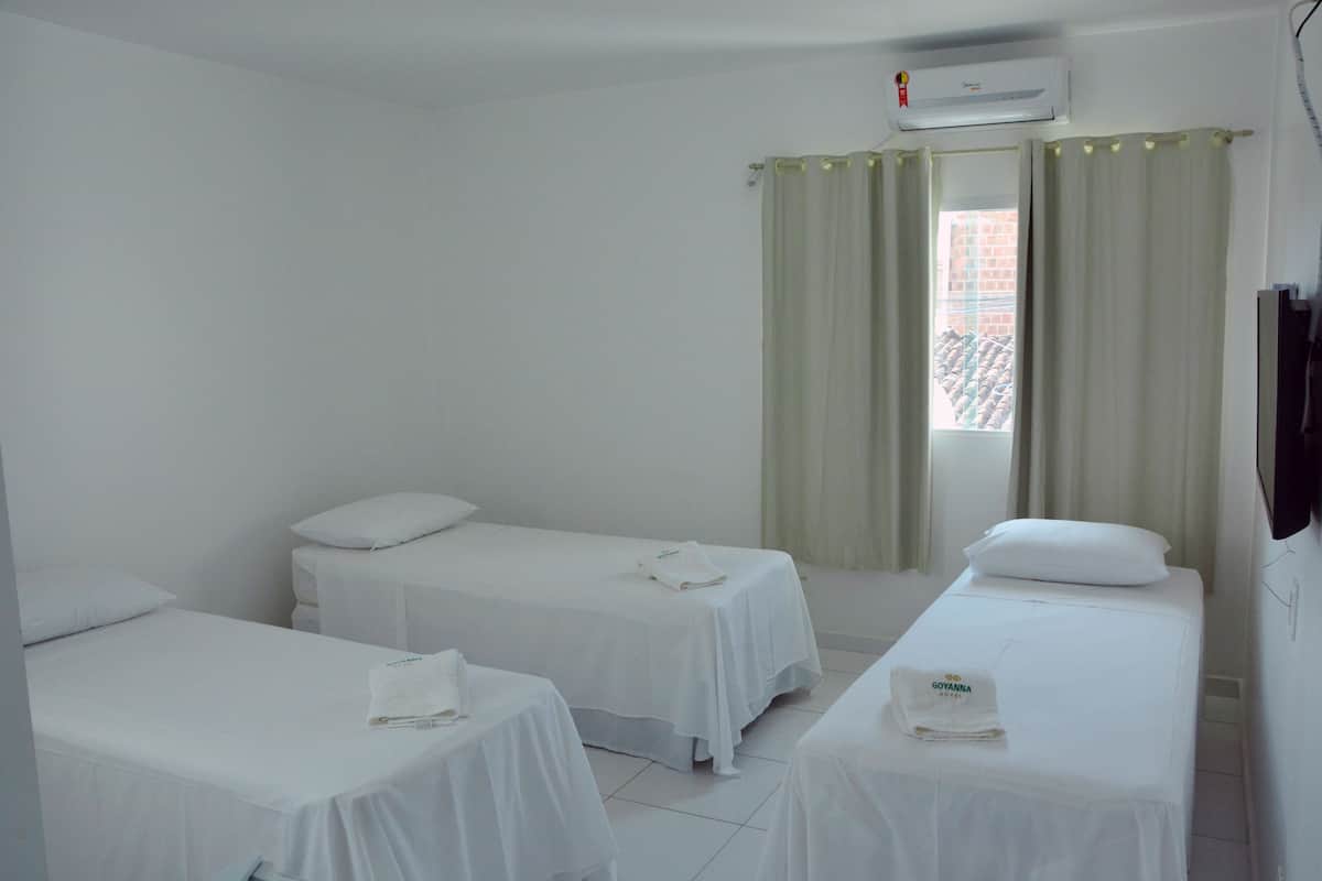 Triple Room | Minibar, desk, iron/ironing board, rollaway beds