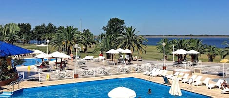 Indoor pool, outdoor pool, pool umbrellas, sun loungers