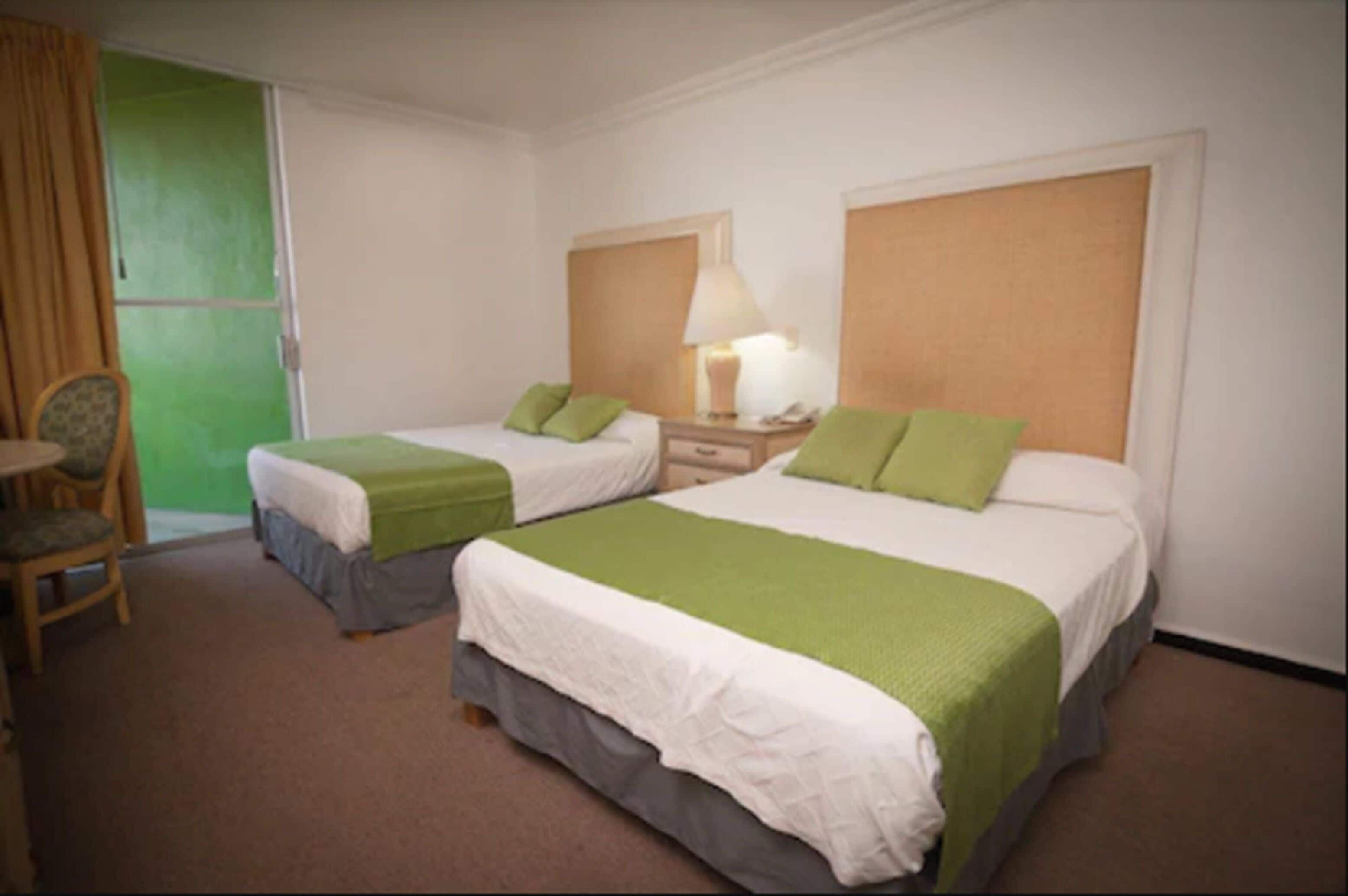 Standard Room, 2 Double Beds | In-room safe, desk, iron/ironing board, free WiFi