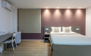 Suíte | Frigobar, cofres nos quartos, escrivaninha, cortinas blackout