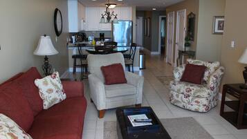 Condo, 2 Bedrooms, Balcony, Beachfront | Living area | Flat-screen TV, DVD player
