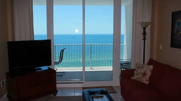 Condo, 2 Bedrooms, Balcony, Beachfront | Living area | Flat-screen TV, DVD player