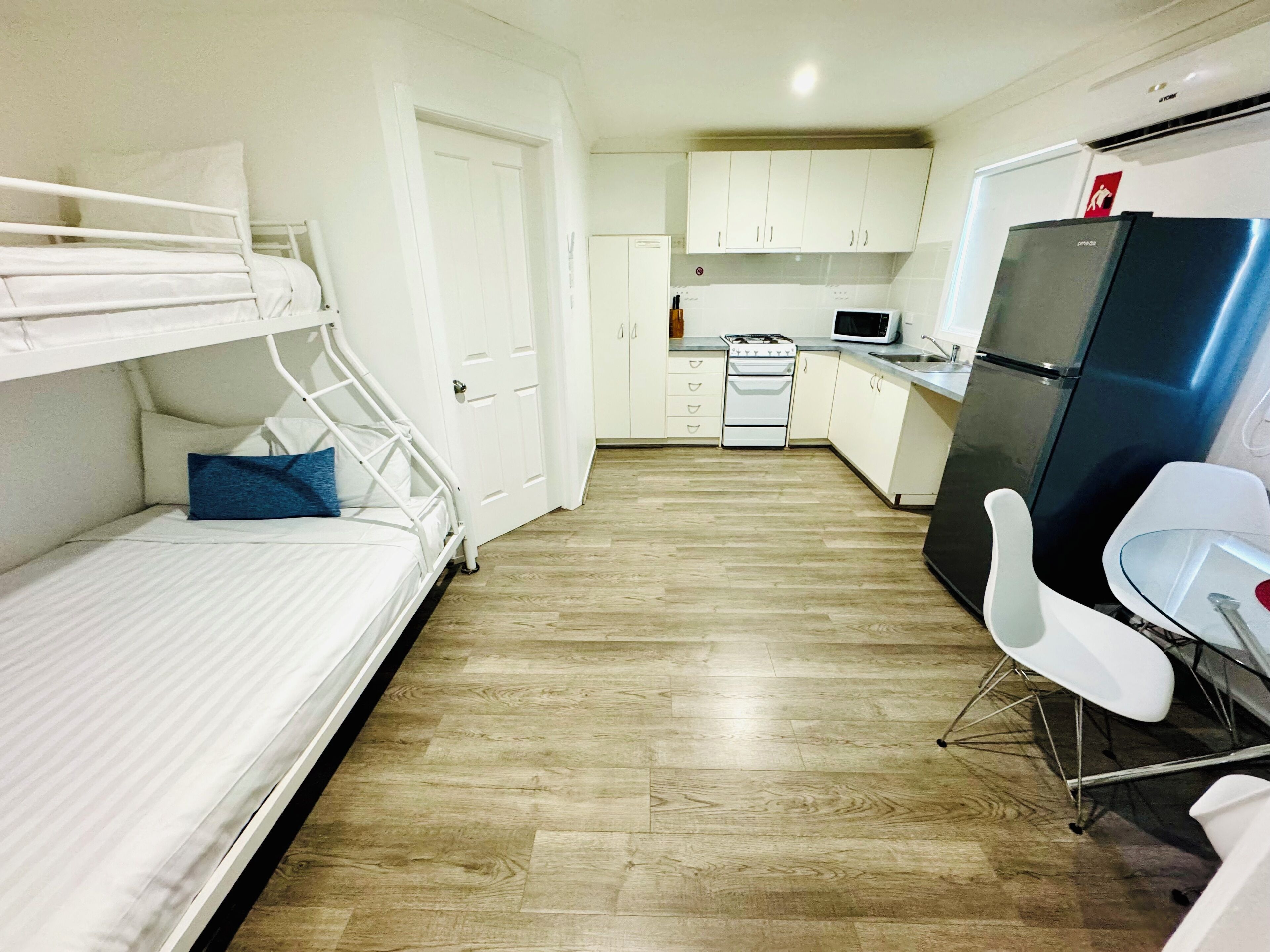Deluxe Cabin, 1 Bedroom, Patio | Living area | 32-inch TV with cable channels