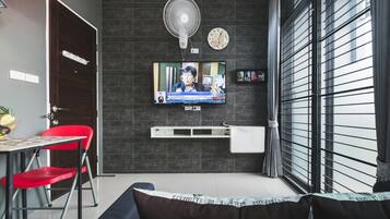 Superior Townhome, 1 King Bed | Living area | Flat-screen TV