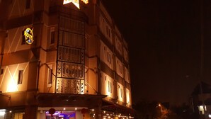 A building with a 'Rock & Roll Hotel' sign, multiple windows, and a decorative facade. - Rock & Roll Hotel (Klang)