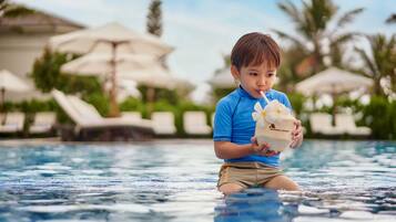 2 outdoor pools, pool umbrellas, lifeguards on site