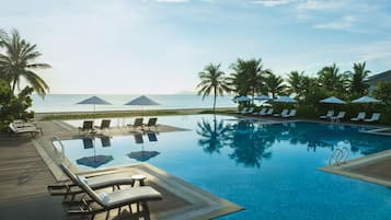 2 outdoor pools, pool umbrellas, lifeguards on site