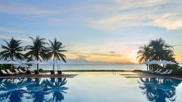 2 outdoor pools, pool umbrellas, lifeguards on site