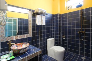 Shower, free toiletries, hair dryer, slippers