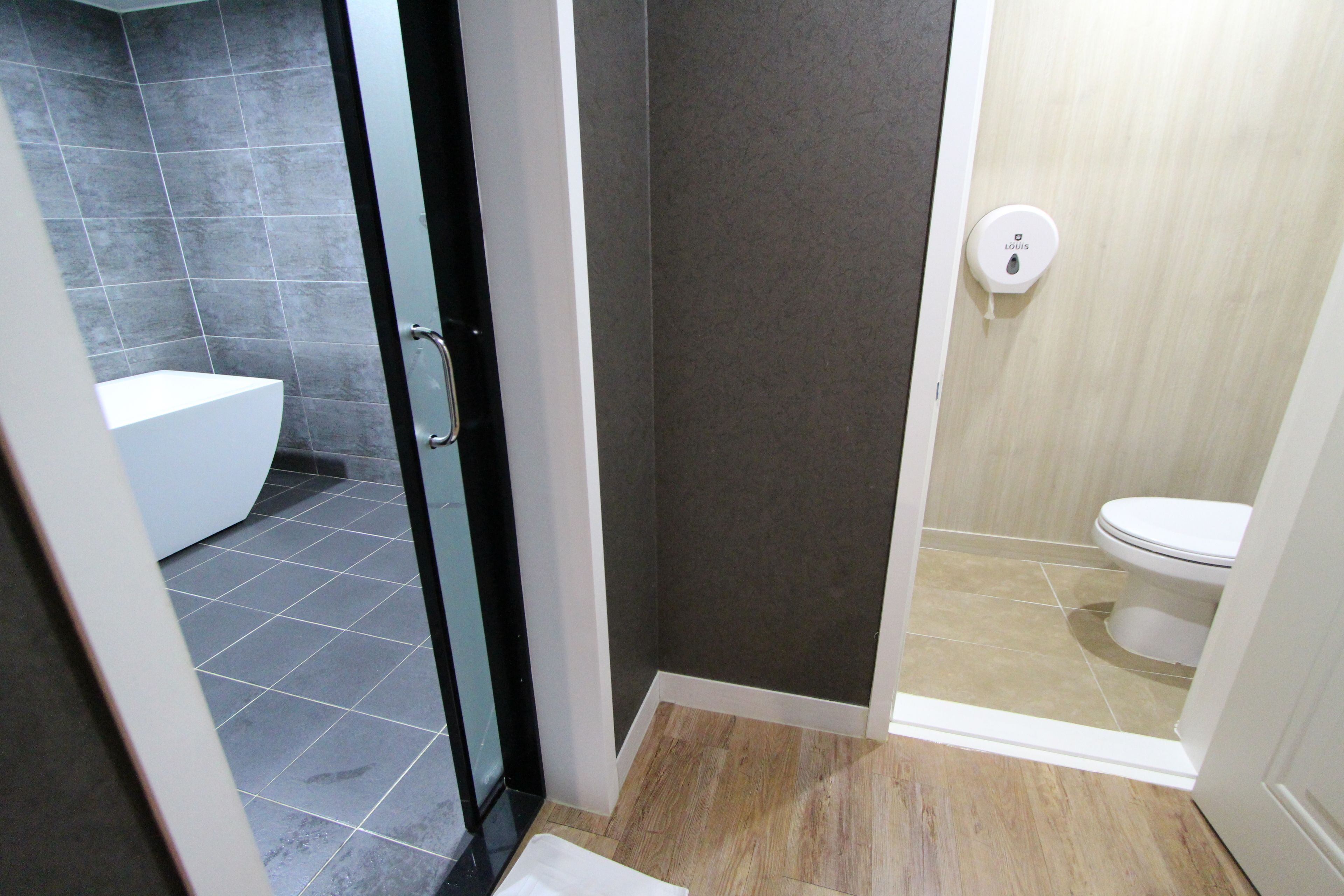 separate bathtub and shower, free toiletries, hair dryer, towels