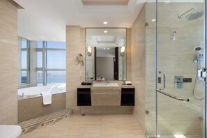 Deluxe Suite | Bathroom | Combined shower/tub, free toiletries, bathrobes, slippers - Grand New Century Hotel (Qingdao)