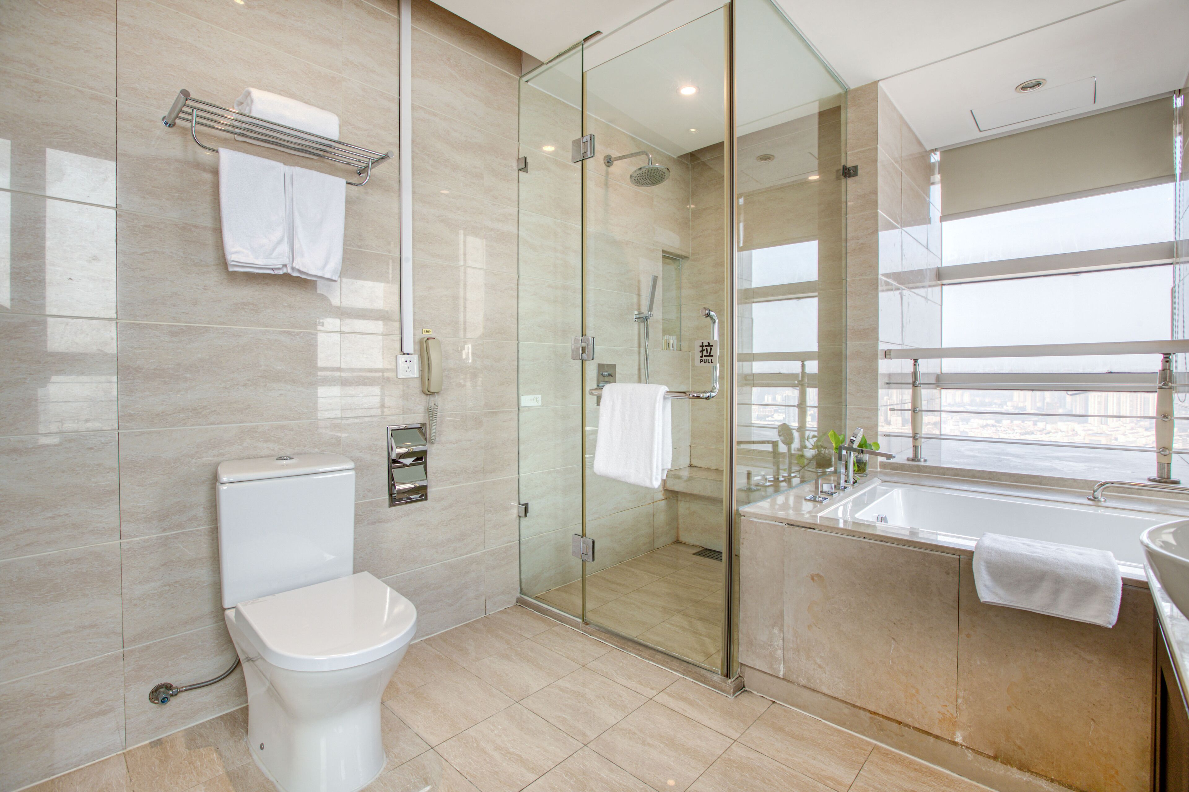 executive king bed room sea view | bathroom | combined shower/bathtub, free toiletries, bathrobes, slippers