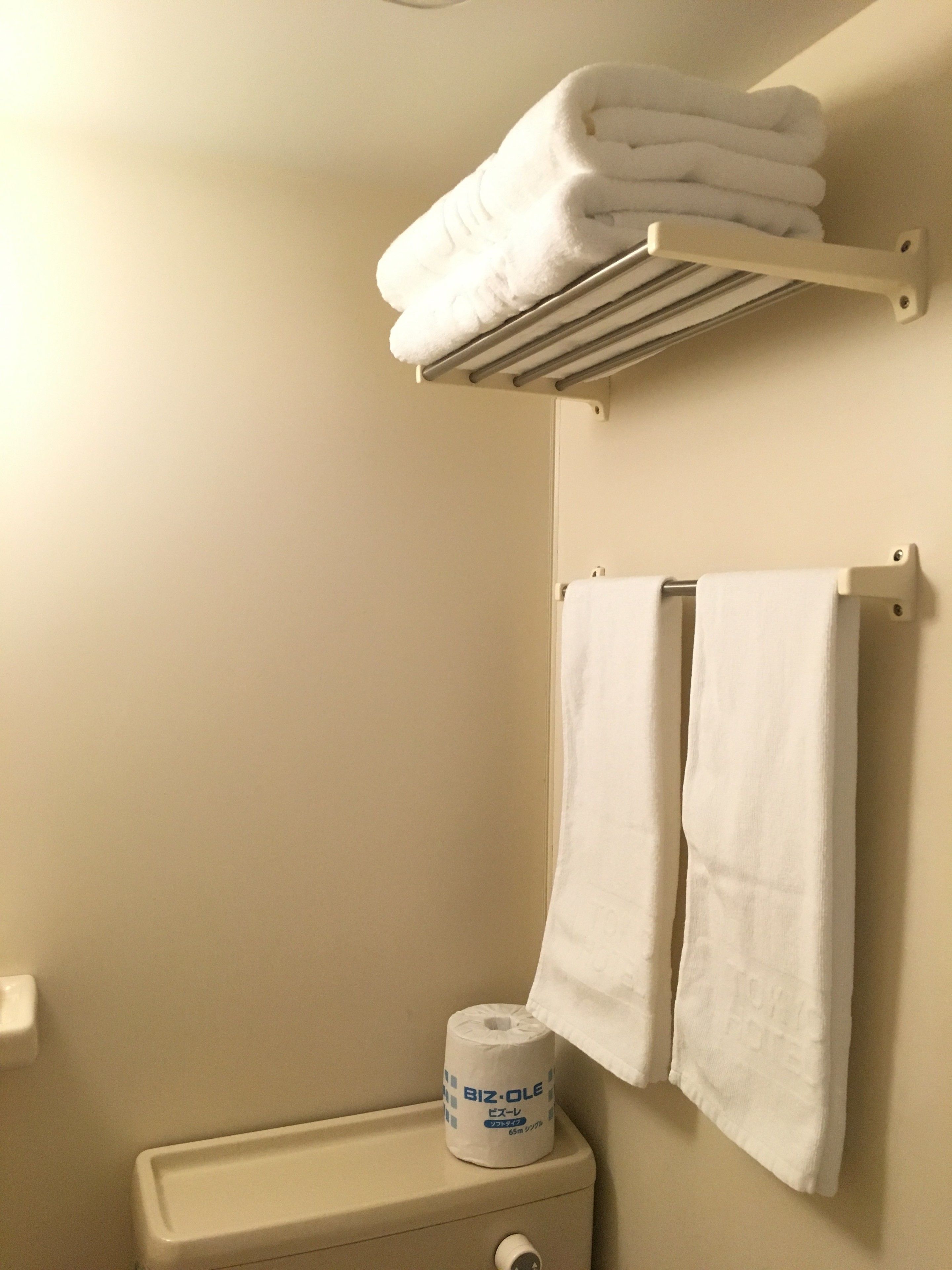 combined shower/bathtub, free toiletries, hair dryer, slippers