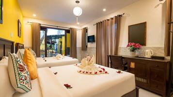 Deluxe Triple Room, Pool View | 1 bedroom, minibar, in-room safe, individually furnished