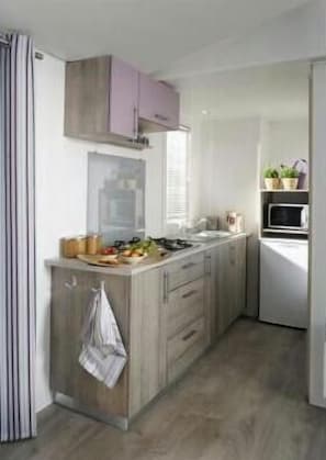 Fridge, stovetop, espresso maker, cookware/dishes/utensils