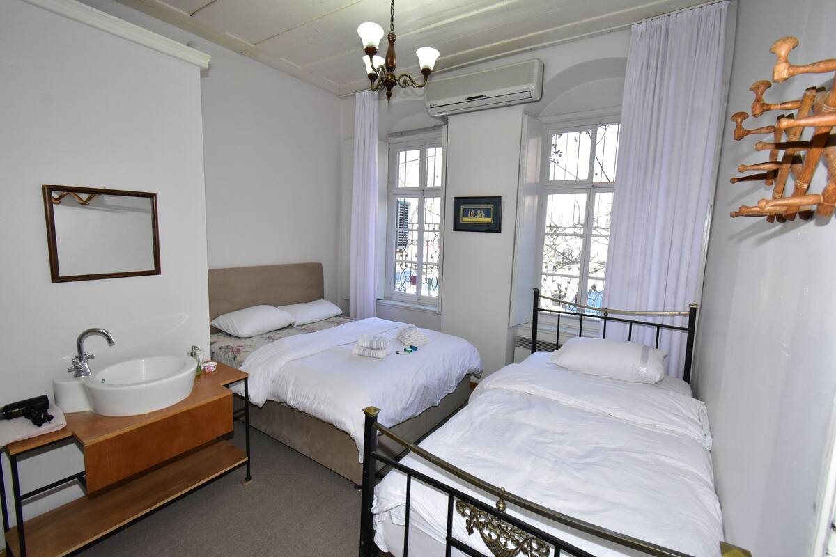 Family Triple Room, Multiple Beds, City View, Ground Floor (White) | Egyptian cotton sheets, premium bedding, individually decorated