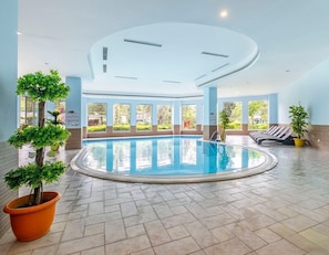 4 indoor pools, 4 outdoor pools, open 7:00 AM to 7:00 PM, pool umbrellas