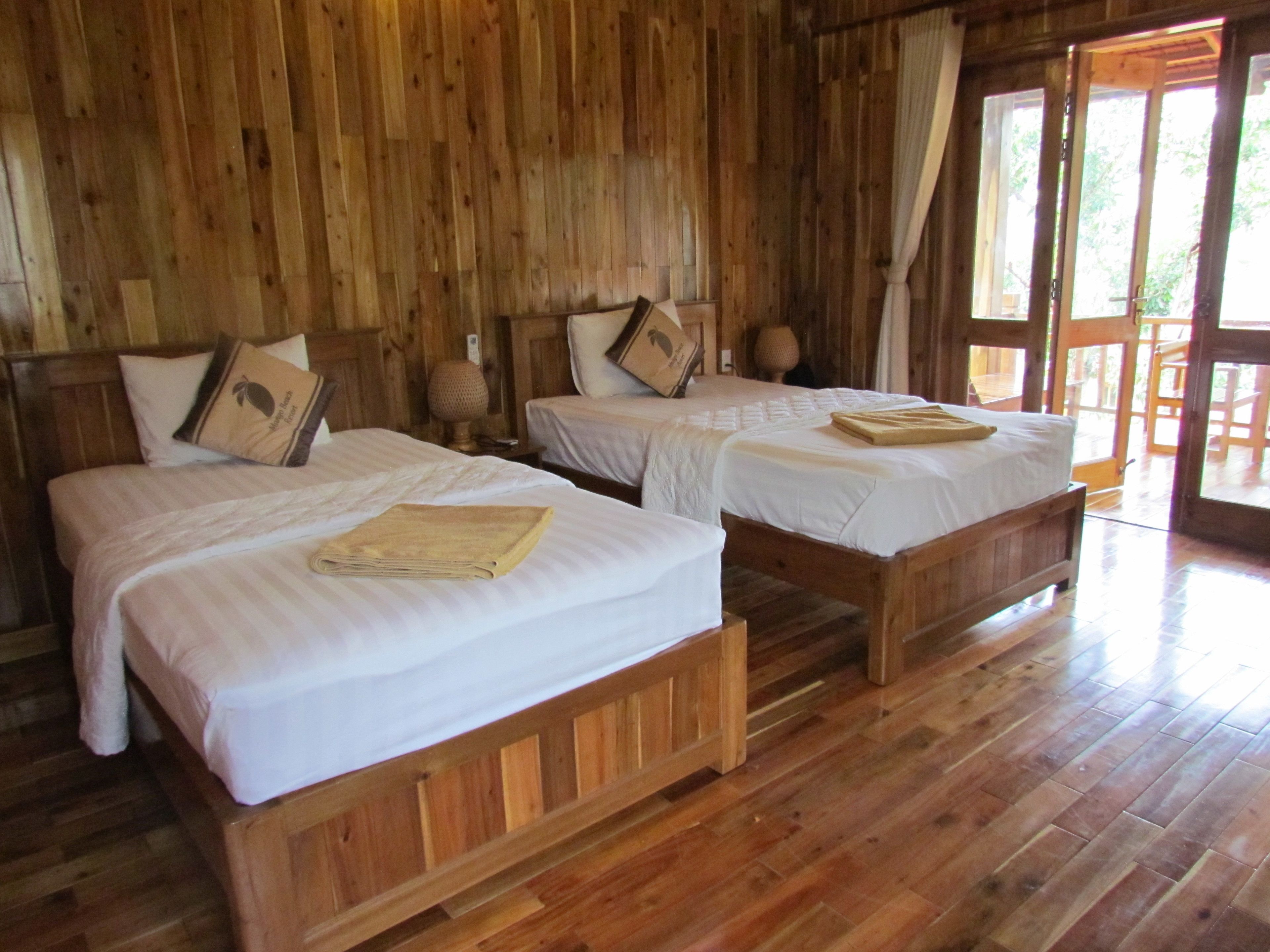 standard bungalow, multiple beds, kitchen, ocean view | 1 bedroom, minibar, in-room safe, desk